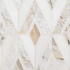 a white and beige marble wallpaper with an abstract geometric design on it's surface