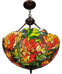 a large stained glass bowl hanging from a ceiling fixture with flowers in the center and leaves on it