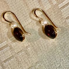 Vintage Ed Levin 14k, Pearl & Garnet Cabochon Earrings In Pristine Condition. Signed By Artist & Samped 14k. Brand New Condition. Nos. Were Never Worn. Beautifully Made Classically Designed Petite Earrings That Are Very Comfortable To Wear, Earrings Are .75" Long. & .25" Wide. Each Square Of Graph Paper Is 1/4". Very Well Crafted And Ergonomically Designed. Lightweight & Dainty For Those Sensitive To Heavy Earrings. This Earring Design Was Retired By Ed Levin Design Studio In 2008 And Will Not B Classic Pearl Gemstone Earrings As Gift, Classic Pearl Earrings With Gemstone For Gift, Yellow Gold Garnet Round Earrings, Classic Oval Earrings With Ear Wire, Elegant Garnet Drop Earrings, Elegant Garnet Teardrop Earrings, Elegant Oval Garnet Earrings, Classic Cabochon Earrings For Formal Occasions, Classic Teardrop Pearl Earrings With Gemstone