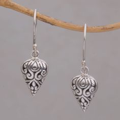 Wayan Asmana proudly presents a regal pair of dangle earrings from Bali in celebration of local craftsmanship. Crafted of sterling silver by local artisans each earring takes a pointed shape elaborated with swirling vine patterns. Xoxo Necklace, Pmc Jewelry, Bali Jewelry, Jewelry Techniques, Silver Dangle Earrings, Sterling Silver Dangle Earrings, Earring Crafts, Metal Earrings, Silver Earrings Dangle