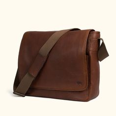 Crafted from the rich and textured full grains of buffalo hide, our limited edition Roosevelt Buffalo Leather Satchel showcases the deep and natural brown grains unique to each piece. With dimensions of 17" long and 13" high, it offers padded space for a 15" laptop screen display laptop (measured diagonally), additional storage under the flap, and an area to hold pens and accessories. Safeguard your valuables in the interior or exterior zipper pockets. The satchel's interior features our interio Rugged Brown Soft Leather Bag, Brown Smooth Grain Satchel For Everyday Carry, Classic Bags In Textured Oiled Leather, Classic Brown Pebbled Leather Shoulder Bag, Brown Pebbled Leather Shoulder Bag With Leather Lining, Brown Oiled Leather Bag With Smooth Grain, Classic Brown Textured Leather Bag, Rugged Brown Shoulder Bag With Leather Lining, Everyday Carry Textured Leather Brown Bag