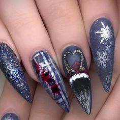 Kori Peterman on Instagram: "Super classy Krampus nails this year. We left off the bag of dead bodies this time 🤣 #nails #longnails #stilettonails #mattenails #christmas #christmasnails #nailart #handpainted #krampusnails #krampus #opi #winternails #nailsoftheday #nailsofinstagram" Krampus Nail Designs, Scary Christmas Nails, Krampus Nail Art, Creepy Christmas Nails, Alternative Christmas Nails, Krampus Nails, Dark Christmas Nails, Goth Christmas Nails