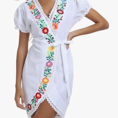 Yzxdorwj Women's Mexican Floral Embroidered Wrap Dress, V Neck, Short Sleeve, Beach Dress, From Shoulder To Hem 40 In Long. Puffy Short Sleeve 7in Long. Size L, New With Tags, Wrap Around Style. 100% Cotton, Soft And Light Weight, Breathable, Skin Friendly. The Flower Embroidery In Front Is Colorful, And The Elastic Band Behind It Is Suitable For People Of Any Size To Wear, Which Can Fully Show Your Curves. This Dress Boasts A Traditional Mexican Floral Design Combined With A Modern Style Dress. Fitted Embroidered Mini Dress For Vacation, Folk Style Spring Vacation Dresses, Spring Vacation Folk Dresses, Embroidered Short Sleeve Mini Dress For Vacation, White Embroidered Mini Dress For Spring, Folk Style Embroidered Short Sleeve Dress For Summer, Folk Style Embroidered Short Sleeve Dress For Spring, Summer Folk Style Embroidered Dress With Short Sleeves, White Embroidered Mini Dress For Vacation