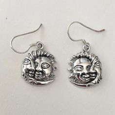 *      Sterling Silver Half Moon and Sun Face Dangling Earring, Boho Earring, Silver Earring, Moon Earring,         Dangling Earring, Sun Earring, Celestial Earring, Love          Earring, Sky Earring, Happy Earring, 925 Stamped *      The Symbolizes firmness, strength and power while the moon represents calmness, beauty, nurturing *Perfect gift idea for Birthday, anniversaries, engagement, graduations, bridesmaid, Mother's Day,          Valentine's Day, promise, good for any occasion.  *Note: D Metal Earrings With Sun And Moon Design As Gift, Metal Earrings With Sun And Moon Design, Metal Sun And Moon Design Earrings For Gift, Adjustable Sun And Moon Design Drop Earrings, Sterling Silver Sun And Moon Dangle Earrings, Sterling Silver Dangle Earrings With Sun And Moon Design, Symbolic Dangle Earrings With Sun And Moon Design, Symbolic Moon-shaped Earrings For Gift, Symbolic Sun And Moon Dangle Earrings