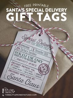 the santa's special delivery gift tags are tied with twine