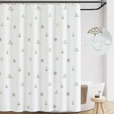 a shower curtain with an anchor pattern on it in a white and beige bathroom setting