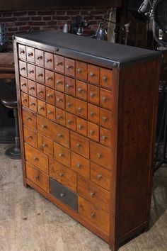 an old wooden dresser with many drawers