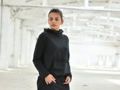 "Black Hoodie, Loose Sweatshirt, Black Sweatshirt Please have in mind that the piece is made from 100% cotton, except the red and dark gray colors which are made from 70% cotton and 30% polyester. ◈ Stylish and chic fashion is our shared dream! You can be sure that this piece is made with a lot of love and craftsmanship. ◈ S I Z I N G ◈ This item is available from XS to 4XL. Please, have a look at my Size Chart below before placing your order. ◈ D E L I V E R Y ◈ This item will be shipped in up Stretch Top With Kangaroo Pocket For Winter, Casual Black Sweatshirt With Funnel Neck, Stretch Hoodie Top With Pockets, Black Sweater With Kangaroo Pocket For Fall, Black Casual Top With Kangaroo Pocket, Casual Black Top With Kangaroo Pocket, Black Fall Sweater With Kangaroo Pocket, Black Sweatshirt With Funnel Neck In Relaxed Fit, Black Sweatshirt With Relaxed Fit And Funnel Neck