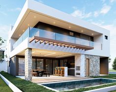 a modern house with an outdoor dining area and pool in the foreground, surrounded by grass