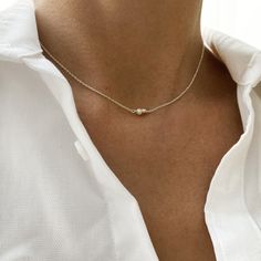 Silver necklace with a white pearl. This discreet neck with a small silver pearl and a very bright cultured pearl seems to float on your neck on a 925 silver chain. Simple and elegant the pearl necklace in its soft shades is the ideal jewel of the bride but also it is perfect for wearing every day. This necklace will highlight all your beauty with elegance. Perfect gift woman! ------------- (Choose the desired collar size when adding to the basket.) ------------- The necklace measures 36cm, 38cm White Pearl Diamond Necklace With Pearl Chain, White Diamond Necklace With Pearl Chain, Everyday White Gold Necklace With Pearl Charm, Everyday White Gold Pearl Drop Necklaces, Everyday White Gold Necklace With Pearl Drop, Everyday White Gold Pearl Drop Necklace, Everyday White Gold Pearl Necklace, Elegant White Charm Necklace Choker, Elegant White Gold Charm Necklace With Pearl Pendant