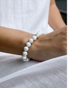 Howlite is a stone of awareness. It can help you to remain calm and centered in times of stress or chaos. Howlite also aids in the development of patience, tolerance, and understanding. Wearing a howlite bracelet can help you to stay connected to the peace and tranquility that resides within you. Natural Stone Howlite Bracelets As Gift, Minimalist Gemstone Beads Bracelets For Meditation, Natural Stone Bracelets For Gifts, White Minimalist Crystal Bracelet For Everyday, Minimalist White Crystal Bracelet For Everyday, White Howlite Spiritual Jewelry, White Gemstone Beads Stretch Bracelet For Meditation, White Hypoallergenic Spiritual Beaded Bracelets, Minimalist Bracelets With 8mm Beads For Healing