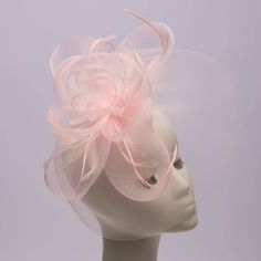 This comb head accessory is the peak of elegance. Because it is made of crinoline, it will delicately add a pop of color to your ensemble. Material: Polyester Handmade Item. Origin: Made in Taiwan Color on screen may vary from actual merchandise due to monitor restrictions or dye lots. Cocktail Pink, Monies Jewelry, Handmade Comb, Cotton Loungewear, Diva Boutique, Hair Bonnet, Boutique Stores, Fascinator Hats, Khaki Dress