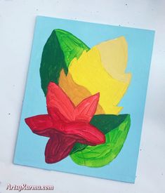 the painting is made with colored paper and has flowers painted on it's sides