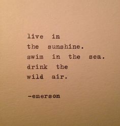 an old typewriter with the words live in the sunshine swim in the sea drink the wild air