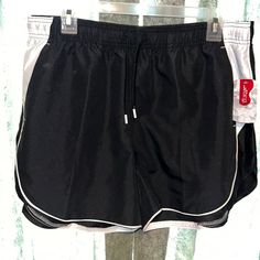 Black Shorts With White Trim. Nwt. Has Pockets & Drawstring. Black Color Block Shorts For Summer, Black Shorts With Contrast Color For Summer, Black Summer Shorts With Contrast Color, Sporty Black Shorts With Contrast Color, Summer Black Color Block Shorts, Black Sporty Shorts With Contrast Color, Sporty Black Color Block Shorts, Black Sportswear Bottoms With Built-in Shorts, Black Moisture-wicking Cotton Athletic Shorts