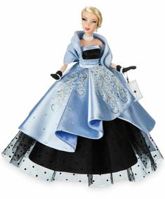 a barbie doll dressed in blue and black