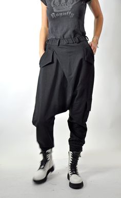 "Harem Pants, Black Pants, Women Pants Black loose cotton pants, casual extravagant black pants. Woman black pants. Very comfortable loose pants. Asymmetric Harem Pants with two pockets. This pant is very convenient for your daily life. All my clothes are unique and boutique. Model wearring size: SIZE S (US 6, UK 10, Italian 40, French 38, German 36, Japan 7) bust: fits bust around 35.5\" / 90cm Waist: fits waist around 28\"/ 71cm Hips: fits hips around 38\"/ 97cm For overall height: 5'5\" / 165 Black Pants Women, Loose Cotton Pants, Urban Clothes, Low Crotch Pants, Maxi Pants, Black Harem Pants, Pants Woman, Black Cotton Dresses, Drop Crotch Pants