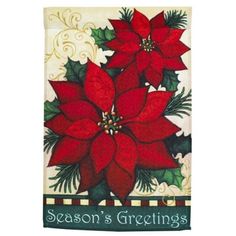 a towel with poinsettis on it and the words season's greetings