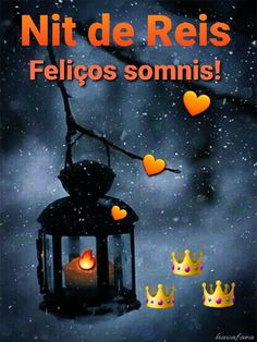 a lantern with hearts hanging from it and the words nit de reis felicos sommis