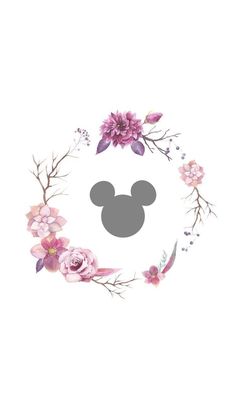 a mickey mouse head surrounded by pink flowers and leaves on a white background with the word disney written across it