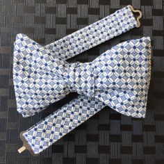 "Handcrafted bow tie for Men. Available in self tie or pre-tied Bow tie. Self tie style are made with adjustable and detachable straps to give the option of keeping the perfectly tied bow tie in place or retying each wear. Each Bow Tie tie is handmade by myself in Canada. My bow ties are made with the best novelty fabrics. Material: Cotton Self tie bow tie fits approximately 15-21\" neck width Adjustable Neck Width for pre-tied bow tie options: Pre-tied bow tie size S (Baby -Toddler) Bow Measurement 1 3/4\" wide x 3 1/8\" long Adjustable straps fit 8.5\" up to 14\" neck circumference. Pre-tied bow tie size M (Child/Teen) Bow Measurement 2 3/8\" wide x 4\" long Adjustable straps fit 10\" up to 18\" neck circumference. Pre-tied bow tie size L (Adult) Bow Measurement 2 3/8\" wide x 4 5/8\" lo Blue Adjustable Bow Tie And Suit Accessories, Dapper Blue Bow With Ties, Adjustable Blue Standard Tie Bow, Blue Adjustable Standard Tie Bow, Adjustable Blue Standard Bow Tie, Adjustable Blue Bow Tie, Dapper Adjustable Blue Ties, Adjustable Blue Bow With Bow Tie Back, Adjustable Blue Bow Ties