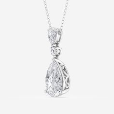 A celebration of smooth curves and sharp edges, this hinged pear shape diamond pendant radiates with effortless elegance. A solitaire lab grown pear shaped diamond creates a beautiful reflection against a smaller pear shaped and round diamond, promoting the elongating effect of this refined shape. Style this pendant on its own for a subtle sparkle or make it the most beautiful part of your layered look. Pear Diamond Pendant, Pear Diamond Necklace, Solitaire Diamond Pendant, Pear Pendant, Diamond Pendants, Fashion Pendant, Diamond Necklaces, Rose Gold Chain, Initial Jewelry