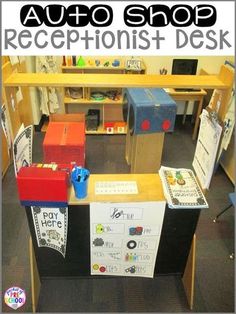 a desk with some boxes on it and the words, auto shop receptionists desk