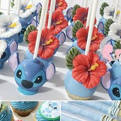 there are many cupcakes decorated like animals and flowers