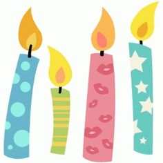 three lit candles with stars and dots on them, one is pink, the other is blue