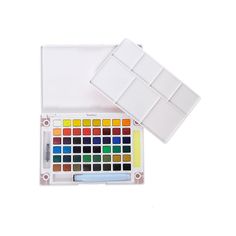 a watercolor palette and its case on a white background