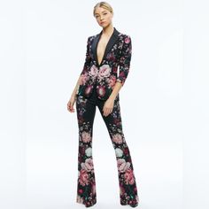 A Floral-Printed Set Is An Easy Way To Add Something A Little More Unique To Your Arsenal. We Love The Dark Palette, The Modern Bootcut Leg, The Mid Rise And The Perfectly Flattering Fit. Blazer Front Button Closure Front Dart Pockets Printed Satin Crepe 98% Polyester, 2% Elastane Dry Clean Only Imported Total Length: 27” Fits True To Size, Take Your Normal Size. Model Is Wearing A Size 2 And Her Measurements Are 5'9.5", 31" Bust, 23" Waist, 34.5 Tailored Floral Print Outerwear For Formal Occasions, Elegant Floral Print Long-sleeved Suits, Elegant Long Sleeve Suits With Floral Print, Elegant Floral Print Formal Outerwear, Glamorous Tailored Long Sleeve Suits, Chic Fitted Blazer With Floral Print, Tailored Floral Print Elegant Blazer, Tailored Elegant Floral Print Blazer, Elegant Formal Outerwear With Floral Print