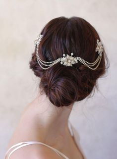 a woman wearing a bridal hair piece