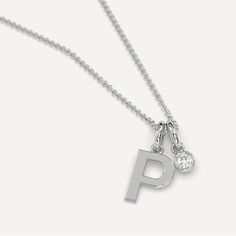 White gold initial P necklace Everyday White Gold Charm Necklaces With Initial Pendant, White Gold Charm Necklaces With Initials For Everyday, Everyday White Gold Charm Necklaces With Initials, Minimalist Silver Diamond Initial Necklace, Diamond Initial Pendant Charm Necklace, Diamond Initial Pendant Charm Necklaces, White Gold Initials Pendant Necklace, Classic White Gold Charm Necklace With Initials, Monogram Initial Pendant Name Necklace In White Gold