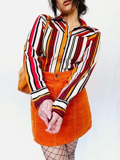 90s vintage colorful striped smart minimalist top blouse Shirt is in great vintage condition. Model usually wears UK 10-12 / S-M / US 6-8. Item could fit UK 12 / M / US 8. Check the measurements before buying. MEASUREMENTS: bust - 100 cm, waist - 88 cm, length - 62 cm. Item made from 96% cotton, 4% elastane. Care delicate. Color may differ slightly depending on the color calibration of the device you're viewing on. If You have more questions about products or shipping, please drop me a message. Multicolor Horizontal Stripe Tops For Spring, Casual Vertical Stripes Blouse For Fall, Multicolor Long Sleeve Top With Vertical Stripes, Collared Tops With Vertical Stripes For Fall, Trendy Striped Collared Blouse, Retro Multicolor Tops For Workwear, Retro Multicolor Tops For Work, Trendy Fitted Striped Blouse, Trendy Fitted Striped Shirt