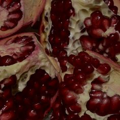 the pomegranates are cut in half and ready to be picked up