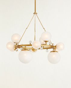 a chandelier with six lights hanging from it