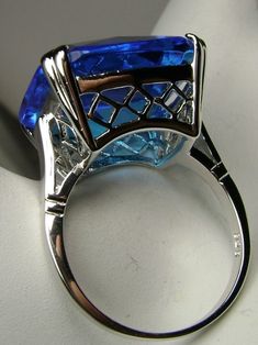 Swiss Blue Topaz Ring, Large square gem in crisscross basket-weave filigree, art deco styled ring, Art Deco Jewelry, Silver Embrace Jewelry Vintage Blue Topaz Ring With Diamond Cut, Elegant Blue Topaz Ring For Formal Occasions, Art Deco Sterling Silver Topaz Ring For Formal Occasions, Art Deco Blue Topaz Ring For Anniversary, Formal Filigree Topaz Ring In Fine Jewelry Style, Formal Art Deco Sterling Silver Topaz Ring, Formal Fine Jewelry Topaz Filigree Ring, Blue Art Deco Topaz Ring For Anniversary, Formal Silver Blue Topaz Ring