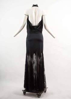 For Sale on 1stDibs - Alexander McQueen Autumn-Winter 2001 black silk and lace evening dress - drop waist - low back - black lace skirt, yoke and collar Sheer Backless Evening Slip Dress, Sheer Backless Slip Dress For Evening, Black Evening Dress With Lace Trim For Gala, Black Slip Dress With Lace Bodice For Party, Backless Slip Dress With Lace Trim For Evening, Black Lace Bodice Slip Dress For Party, Black Lace Trim Backless Slip Dress, Black Silk Evening Dress With Back Opening, Black Lace Slip Dress With Bias Cut