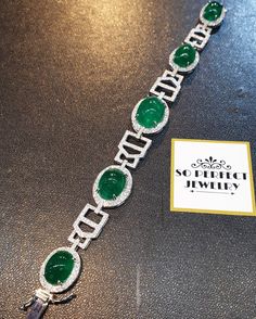 "A DREAM COMES TRUE! Gorgeous masterpiece! ONE OF A KIND Bracelet! Featuring 7 pieces of extra fine GLOWING VIVID GREEN Zambian Emerald weighting a total of 58.94 carats... and 334 pieces of SUPER SPARKLING, top-grade, F/VS Diamonds (4.01 carat in total). SET IN ONE-OF-A-KIND 18K Solid White Gold, meticulously designed and handcrafted BRACELET! A true heirloom piece that can transcend beyond times and eras.... JUST FINISHED, HANDMADE BY OUR GOLDSMITHS! DAZZLING GENUINE EMERALDS! Extremely rare, Luxury Silver Tennis Bracelet With Emeralds, Luxury Round Emerald Bracelets, White Gold Emerald Bracelets, White Gold Emerald Bracelet, Round White Gold Bracelets With Emeralds, Luxury Silver Bracelets With Cabochon, Zambian Emerald, Handcrafted Bracelets, Vs Diamond