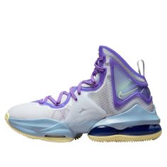 the nike lebrone basketball shoe is shown in white, purple and blue colors