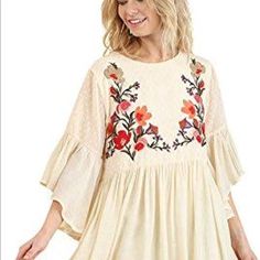 Umgee Floral Embroidered Crew Neck Tiered Babydoll Dress In Cream Multicolor V-neck Embroidered Maxi Dress, Peasant Style V-neck Embroidered Dress, Bohemian Embroidered Dress, Multicolor Embroidered V-neck Beach Dress, Peasant V-neck Embroidered Dress, Folk V-neck Dress With Embroidered Hem, Burnout Velvet Dress, Womens Tunic Dress, Umgee Dress