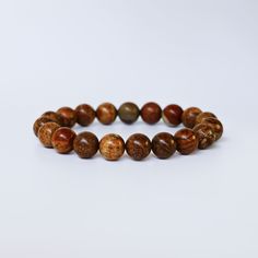 Discover the allure of our Picture Jasper Gemstone Bracelet—each bead a testament to grounding and earth's beauty. With its unique patterns and ancient wisdom, it guides you to serenity and stability through life's journey.












 

 	Crystal: Natural Picture Jasper
 	Type: Beaded Stretch Bracelet
 	Bead Size: 10 MM
 	Bracelet Size: 7 Inches
 	Wrist Size Range: 6 to 7
 	Bead Shape: Round
 	Closure: None
 	Other Materials: N/A Jasper Crystals, Jasper Bead Bracelet, Natural Picture, Crystal Guide, Cleansing Crystals, Bracelet Bead, Jasper Bracelet, Healing Crystal Jewelry, Onyx Bracelet