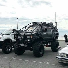 an off road vehicle parked in a parking lot