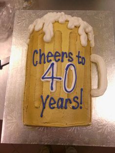 a birthday cake that says cheers to 40 years