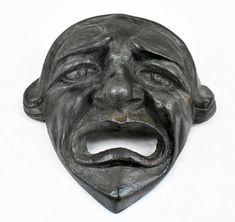 Mini Decorative Mask of Tragedy-Ancient Greek Theatre-Drama-Bronze Colour Effect-Handcrafted in Greece Details: Condition: New, Handmade in Greece Material: Casting stone Height: 13 cm - 5.1 inches Width: 13 cm - 5.1 inches Weight: 300 g The mask was a necessary device for the ancient Greeks who developed the art of theater. Among the two main genres of Greek theater are comedy and tragedy, elements of which are still the fundamentals of all acting today. Masks such as this were important access Roman Theatre Masks, Trojan Women, Theatre Faces, Ancient Greek Theatre, Greek Theater, Decorative Masks, Greek Theatre, Tragedy Mask, Roman Theatre