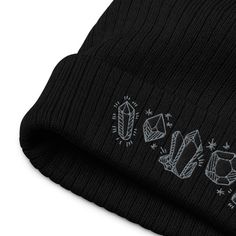 Stay warm while looking cool during the chilly weather! This hat features an embroidery of crystals stitched in grey and black thread on a black eco-friendly recycled ribbed beanie. Thanks to its breathable lightweight fabric, you can wear it both indoors and outdoors. These are made to order by our partner embroidery shop and will ship directly from them to save time and expense. If you order more than one item from my shop this may arrive separately. ► 50% recycled polyester and 50% acrylic ► Winter Cotton Hat For Gifts, Winter Cotton Hat As Gift, Cotton Winter Hat As A Gift, Cotton Winter Hat As Gift, Cotton Winter Hat For Gift, Unisex Cotton Hats For Winter, Boho Beanie, Gold Tissue Paper, Cute Beanies