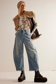 Make statement in this style from Citizens of Humanity, featured in an ultra-wide curved leg silhouette with pleated detailing throughout and raw-edge hem for a perfectly worn look. * Button fly closure * Five pocket design * Authentic rigid denim * Slightly cropped fit | Citizens of Humanity Horseshoe Jeans at Free People in Light Wash, Size: 27 Horseshoe Jeans, Free People Flare Jeans, Barrel Jeans, Jeans Outfit Winter, Jeans Street Style, All Jeans, Cooler Look, Fabulous Fashion, Citizens Of Humanity