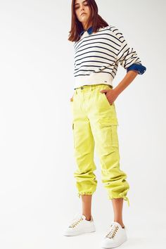 Introducing our Cargo Pants with Tassel Ends in Lime, a stylish and comfortable choice for a casual yet fashionable look. These ankle-length pants are designed to provide a relaxed and effortless fit. With a relaxed fit and straight leg, these cargo pants offer a laid-back style that is perfect for everyday wear. The comfortable fit allows for easy movement, while the straight leg design adds a touch of versatility. Crafted from stretch denim, these pants provide a comfortable and flexible feel. Stretch Denim Fabric, Effortless Outfit, Denim Pocket, Pants Fit, Stylish Pants, Casual Belt, Fuchsia Color, Perfect Wardrobe, Fast Fashion