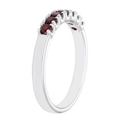 Featuring round-cut garnets, this Boston Bay Diamonds stack ring adds a sparkling touch of color to your everyday look.Click on this JEWELRY & WATCHES GUIDE to learn about fit, styles, materials and more! Metal: sterling silver Packaging: boxed Plating: rhodium Width: 3 mm Finish: polishedSTONE DETAILS Stone type: garnet Stone size: 2.5 mm x 2.5 mm January birthstone Shape: round Setting: prong Diamond weights are approximate. Diamond Total Weights may vary between .01 and .13 ct. Some diamonds Diamond Stacks, Stack Ring, January Birthstone, Garnet Stone, Stacking Rings, Everyday Look, Birthstone, Garnet, Boston