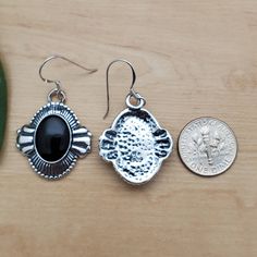 Visit our on-line shop at: Etsy.com/shop/AlbuquerqueDesigns *sterling silver earrings / big concho earrings *dangles / hooks / ear wires / boho earrings *southwestern *black onyx / black stone *calibrated pre-cut stones: big 14x10mm oval shape *back of jewelry items are all covered / do not show the back of stones *all jewelry items are made to ship, slight variations in stones will occur comparing to pictures. *size of a penny is 19mm or a dime is 18mm in diameter for comparing size with jewelr Sterling Silver Black Enamel Drop Earrings, Sterling Silver Drop Earrings With Black Enamel, Black Enamel Sterling Silver Drop Earrings, Silver Teardrop Jewelry With Black Enamel, Black Dangle Pierced Jewelry, Black Pierced Dangle Jewelry, Black Jewelry With Matching Earrings For Jewelry Making, Vintage Black Jewelry With Matching Earrings, Nickel-free Black Dangle Jewelry